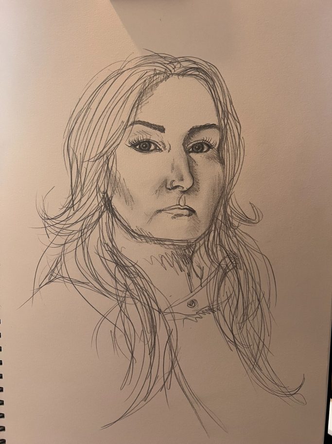 Portrait of a woman with long hair, a serious expression, and defined facial features.