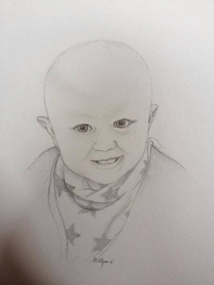 Pencil drawing of a smiling bald child wearing a star-patterned scarf.