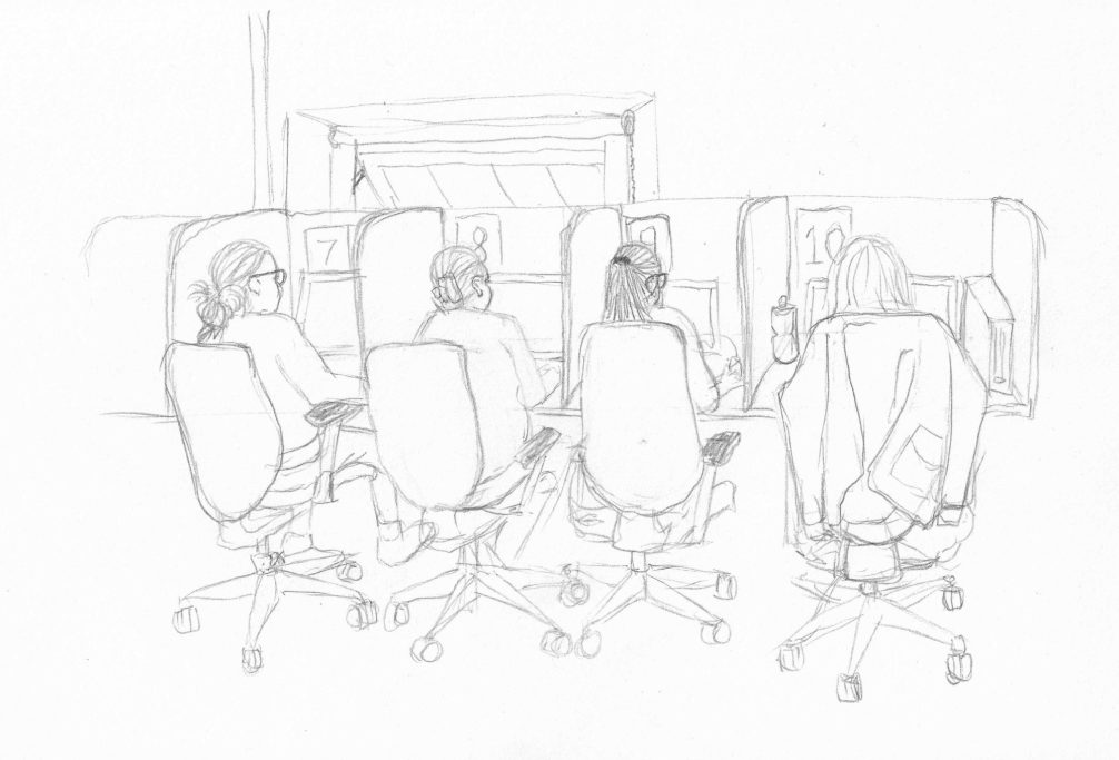 Five people seated in office chairs, viewed from behind, in a workspace setting.